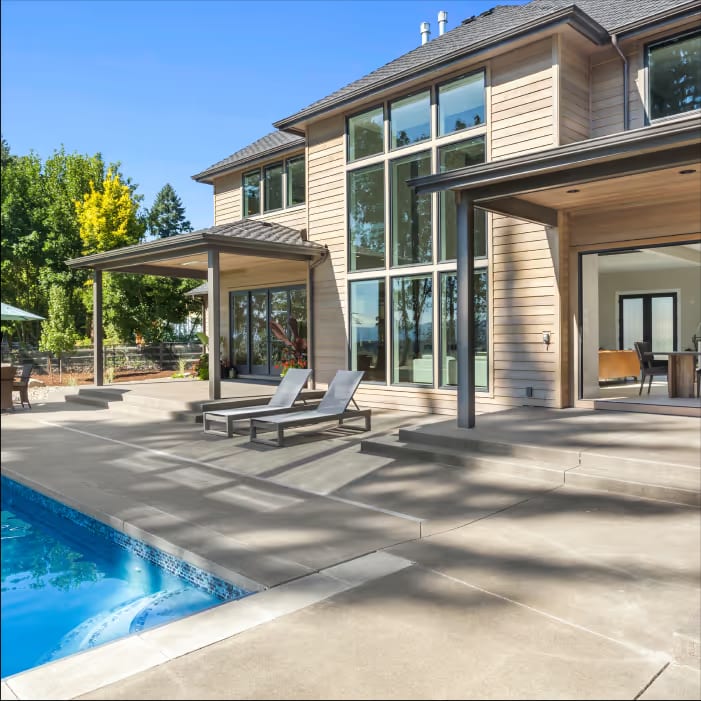 Premium outdoor living space with pool in Oakland County Michigan