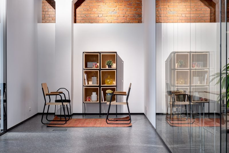 Brickworks + Loft modern shelving area by Reschka Design Build