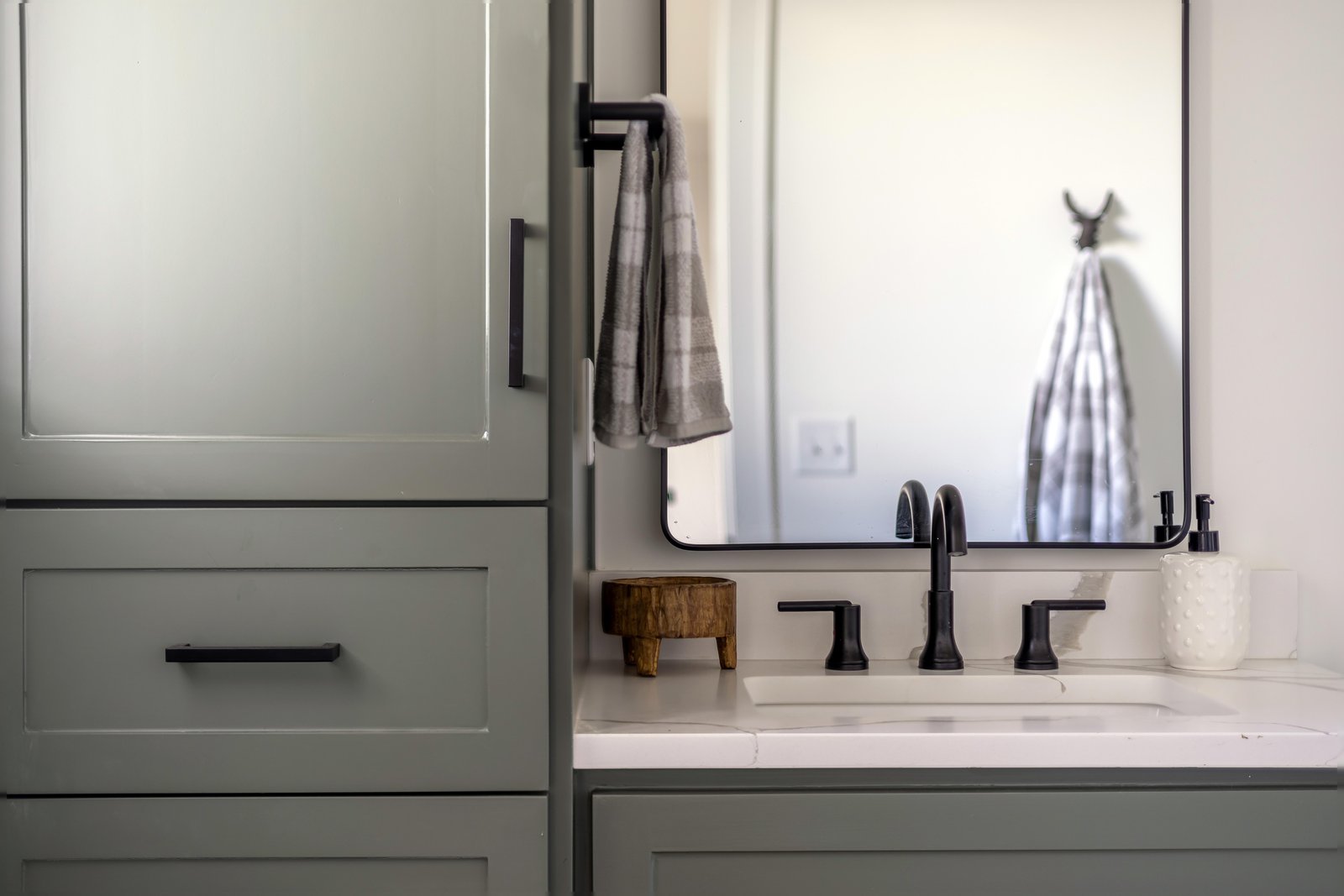 Bathroom detail with custom millwork by Reschka Design Build