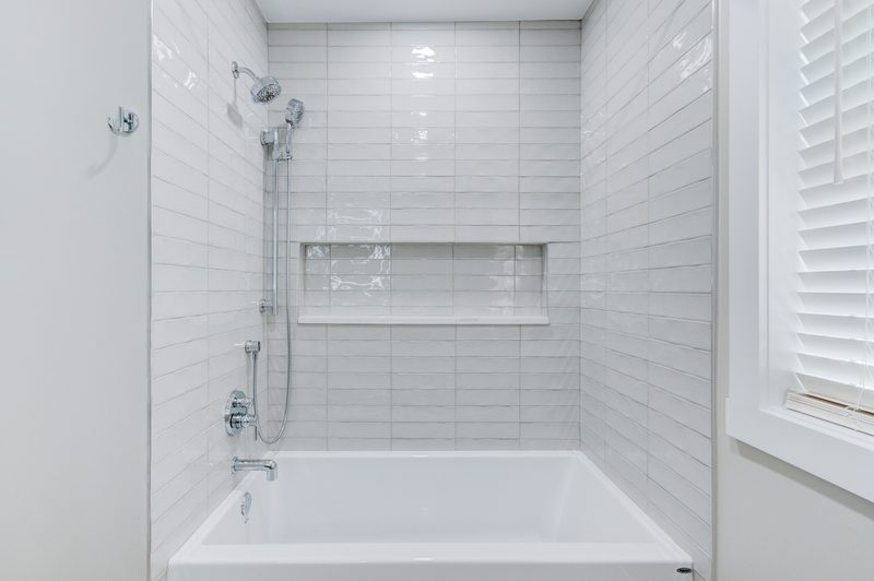 Hazelhurst + Remodel bathroom tub and shower by Reschka Design Build