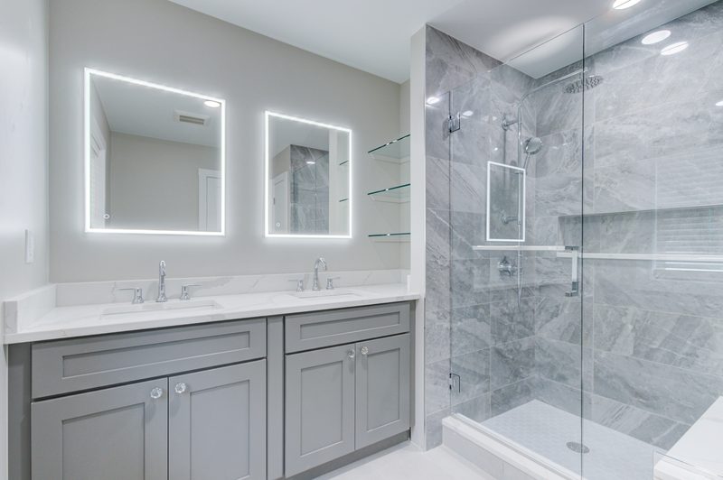 Hazelhurst + Remodel master bathroom vanity and large shower by Reschka Design Build