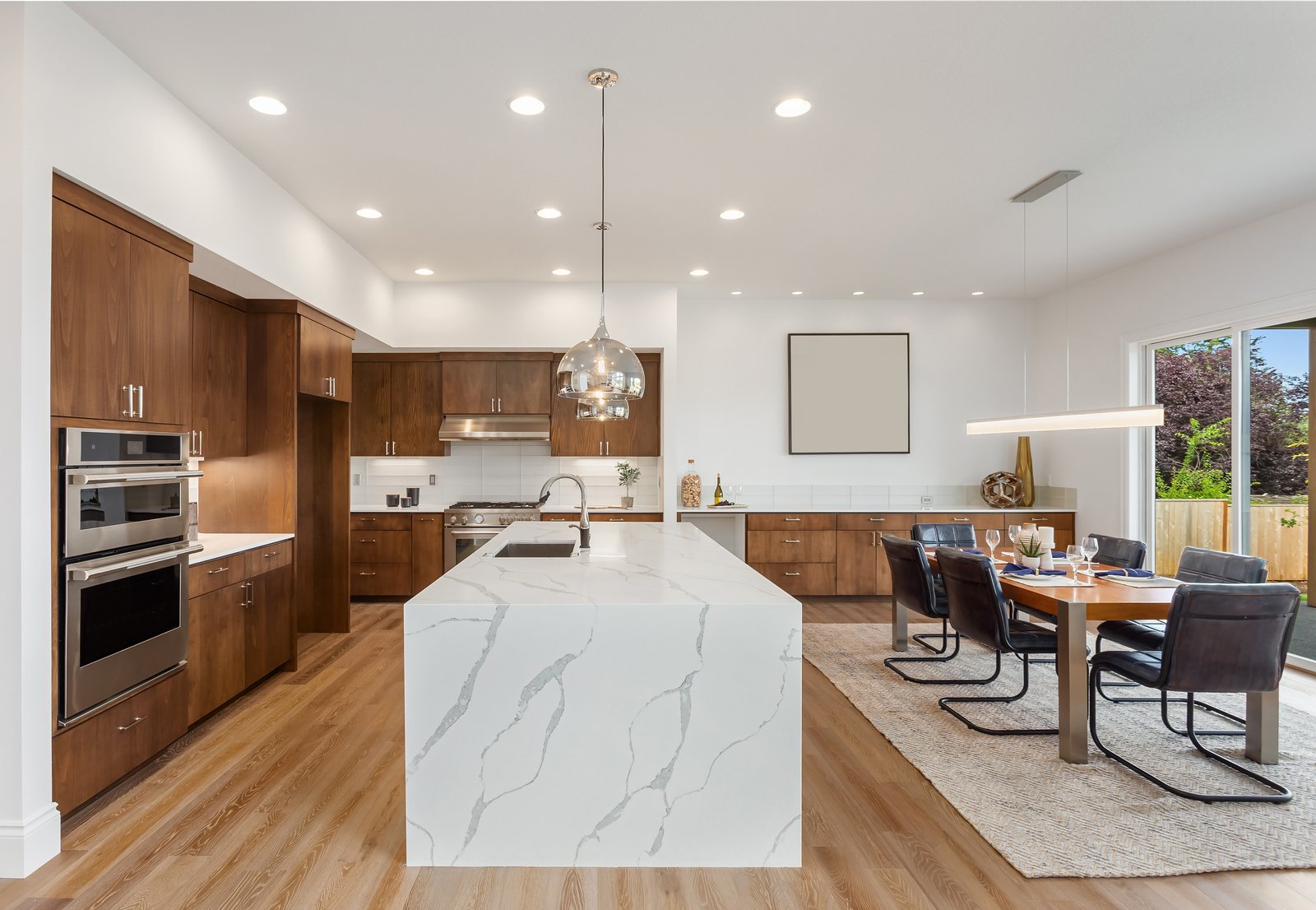 Oakwood + Haven dining and kitchen area by Reschka Design Build