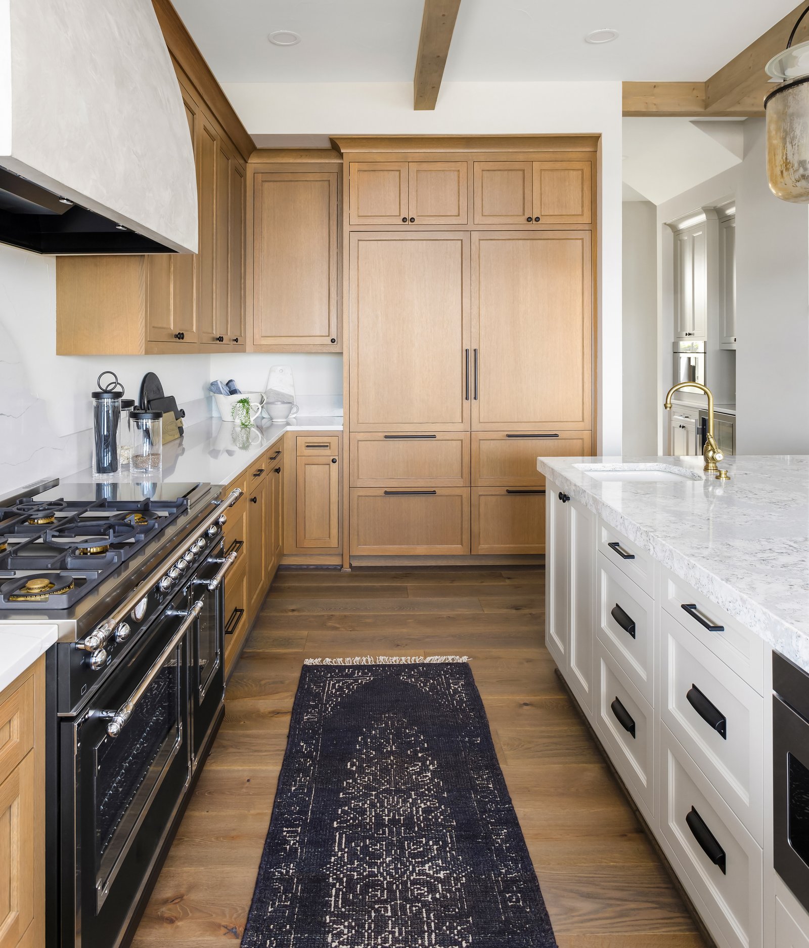 Rustic + Elegance kitchen cooking area by Reschka Design Build